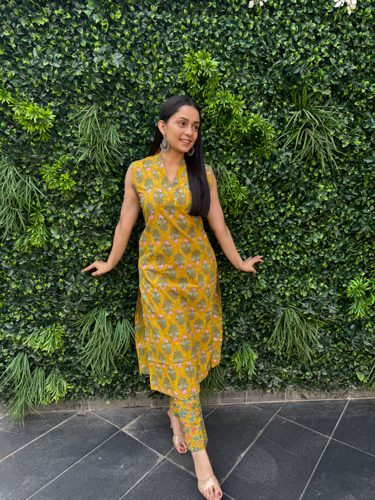 Mustard Yellow Sleeveless Floral Cotton Kurta Set with Printed Pants & Pocket Detail